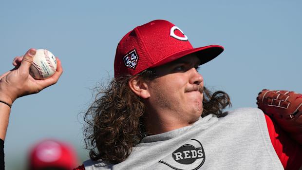 Cincinnati Reds non-roster invitee pitcher Rhett Lowder (81) long tosses during spring training workouts, Saturday, Feb. 17, 2024, at the team's spring training facility in Goodyear, Ariz.  